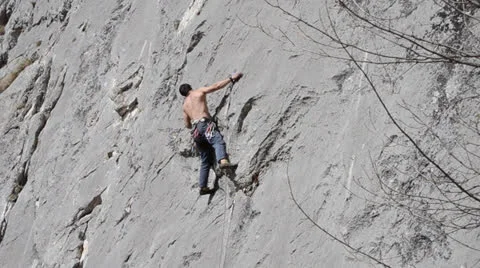 Climber making move then chalking Video stock 23729324