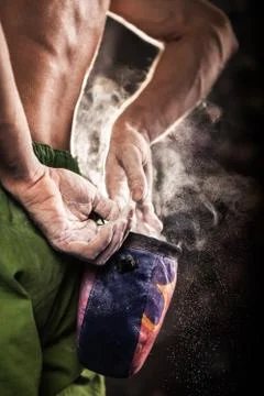 Climber man getting ready for climb indoor, close-up Stock Photos