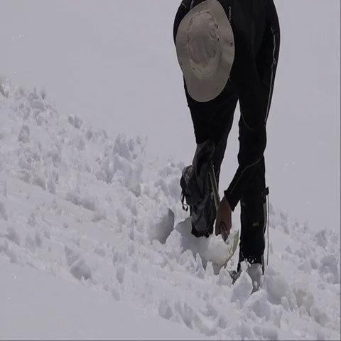 Climber on the mountain digs sensor. Motivation. The mountains Stock Footage 69339879