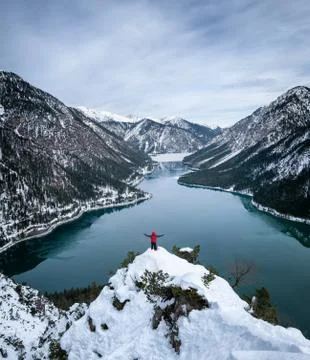 Climber on the mountain peak Stock Photos