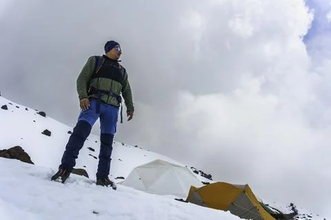 Climber in the mountains winter Stock Photos