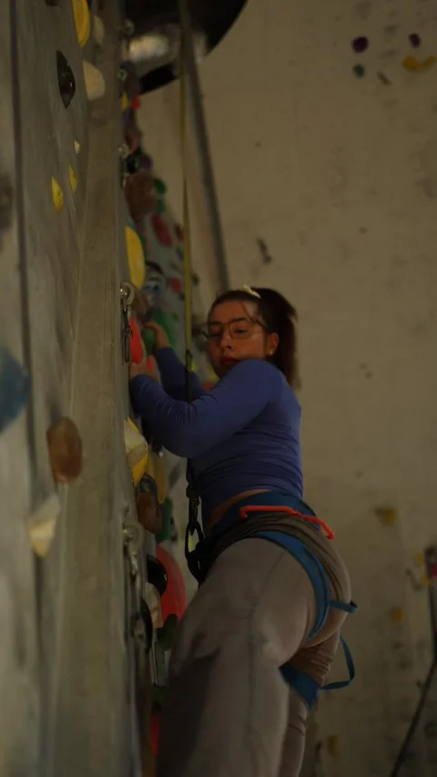 Climber plans the next move Stock Footage 339287701