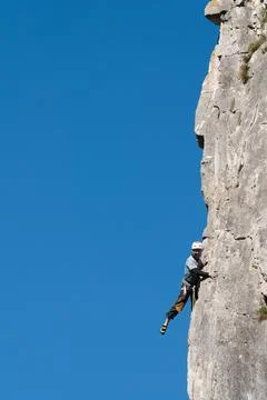 Climber plays on the wall Stock Photos