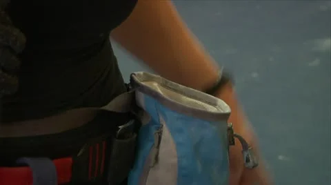 Climber preps with chalk Stock Footage 19762654