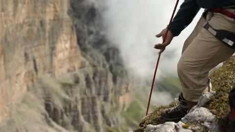 Climber pulls a rope with a load on top. Hands of a climber closeup. Stock Footage 97665637