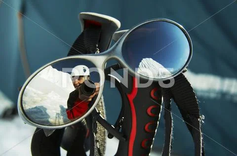 Climber reflection in the eyeglasses Stock Photos