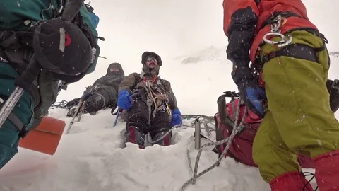 Climber Resting On A Glacier 스톡 동영상 93776135