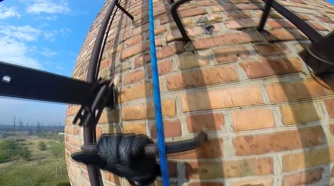 Climber rises on factory chimneys Stock Footage 42416941