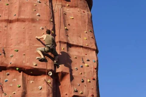 Climber in a rock wall. Stock Photos