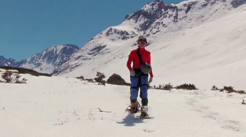 Climber with snowshoes  Видео 57641107