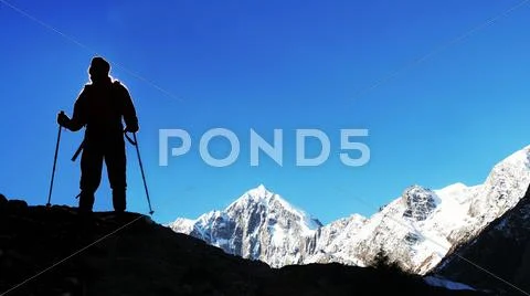 Climber in snowy mountain Stock Photos