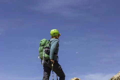 Climber on a summit freedom Stock Photos