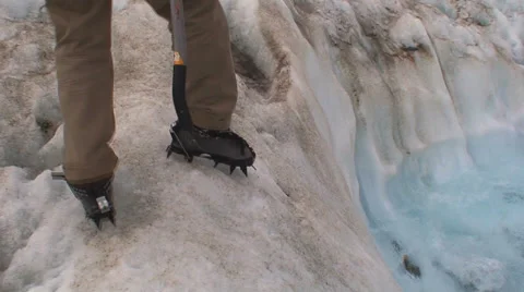 Climber Testing Crampons on Glacier HD Stock Footage 40716978