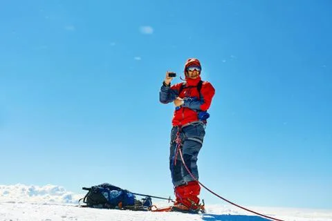 Climber at the top of a pass Stock Photos