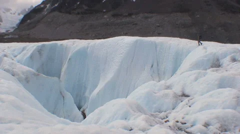 Climber Walking At The Edge of Glacier HD Video stock 41233693