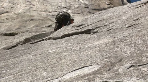 Climber walks down first pitch of El Capitan in Yosemite Stock Footage 8679431