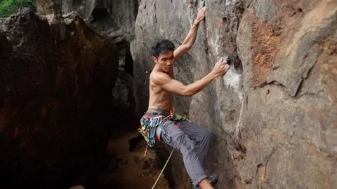 Climber On Wall Of Rough Mountain Stock Footage 137516958