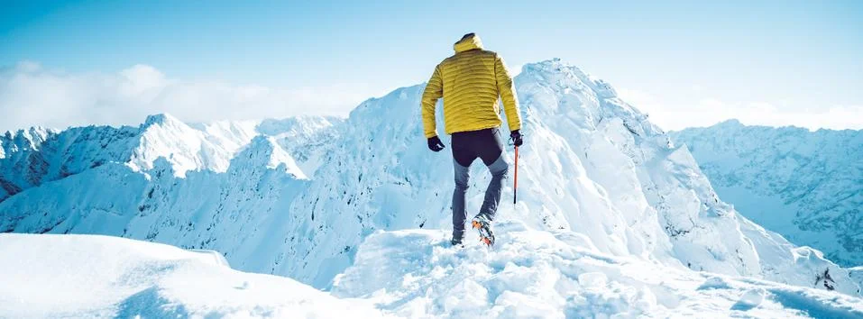 A climber in winter Stock Photos