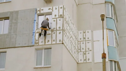 Climber Work On The Building. The Insulation Of Facades of building 스톡 동영상 99245404