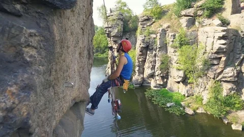 The climber is working on a rock. Stock Footage 78007178