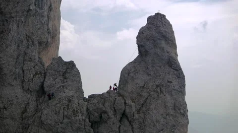 Climbers fall from a rock formation Stock Footage 63305564