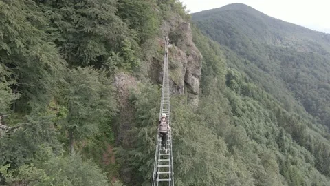 Climbers on a ferrata Stock Footage 232371654