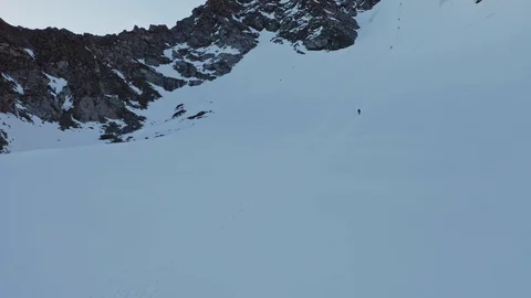 Climbers footprints on mountain slope, alpinists moves over snow obstacles Stock Footage 126363853