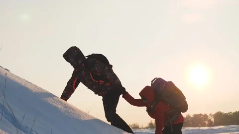Climbers go climbing the mountain forward. teamwork. travelers winter with Video stock 201274599