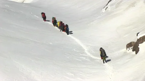 Climbers go up  to the mountain pass Stock Footage 45619306
