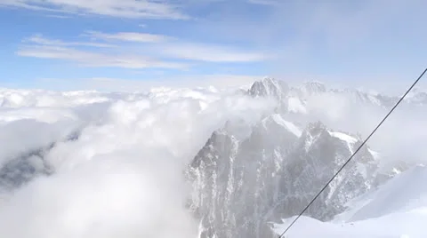 Climbers going down snow ridge Stock Footage 24184507