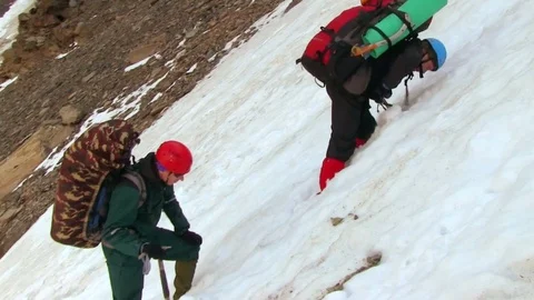 Climbers Going Up To The Mountain, Passing by Stock Footage 70553191