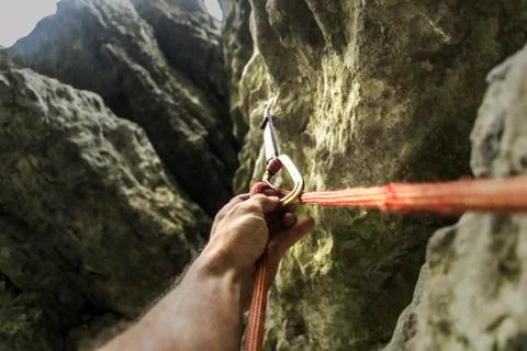 Climber's hand and rope Stock Photos