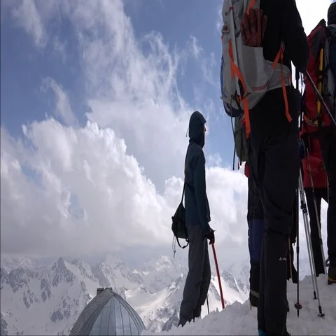 Climbers on Mount Elbrus on a background of clouds. Success. Motivation. Stock Footage 69339180