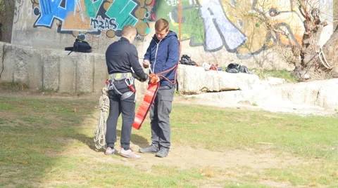 Climbers prepare for jumping rope system Stock Footage 68349518