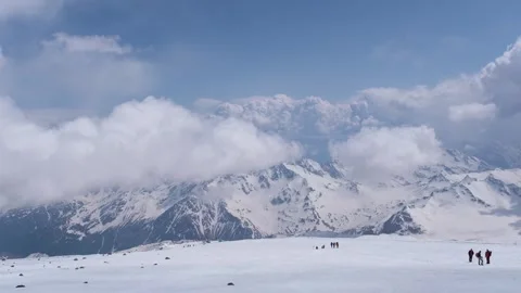 Climbers on the slopes of Mount Elbrus Stock Footage 340558750