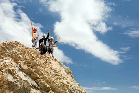 Climbers on summit Stock Photos
