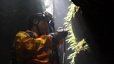 Climbers in uniform and abseiling Stock Footage 133799022