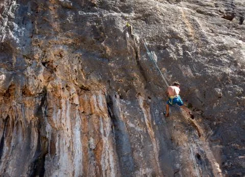 Climbers in the wall of a mountain. 스톡 사진