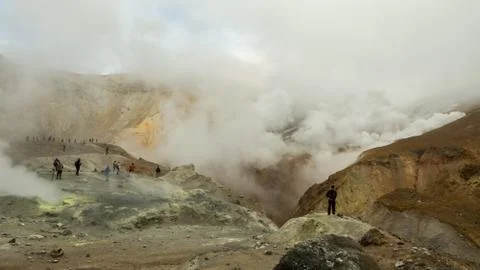 Climbing to active volcano Mutnovsky on Kamchatka Stock Photos
