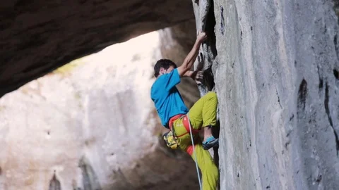 Climbing in a cave Stock Footage 101446683