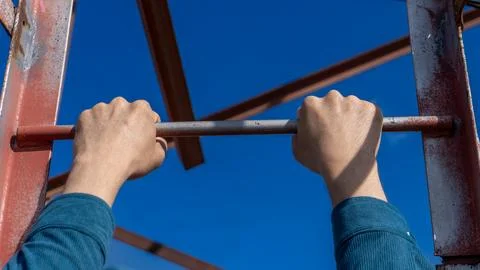 Climbing a communication tower with a view from first-person perspective Stock Photos
