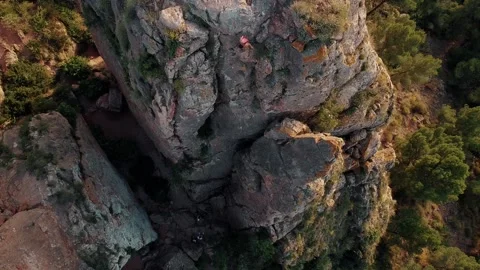 Climbing couple in the mountain. Drone view of climber woman and man Video stock 158536555