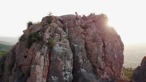 Climbing couple in the mountain. Drone view of climber woman and man Vídeo Stock 158536756