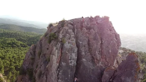 Climbing couple in the mountain. Drone view of climber woman and man Vídeo Stock 158537478
