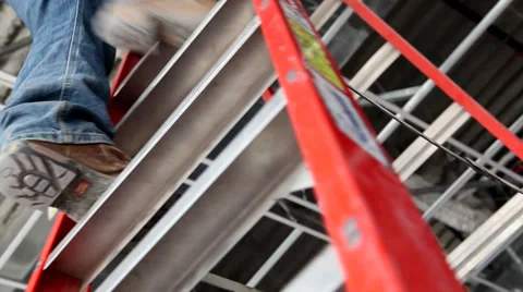 Climbing down ladder construction site  Vídeos de archivo 27823361