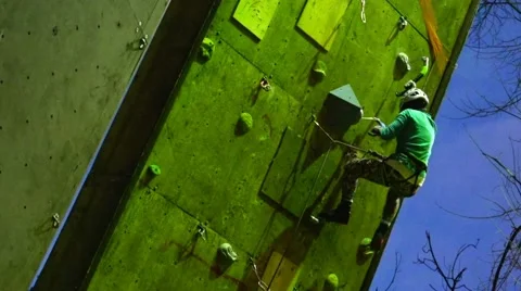 Climbing experienced climber training on the wall. Motivation. Mountain Stock Footage 69035437