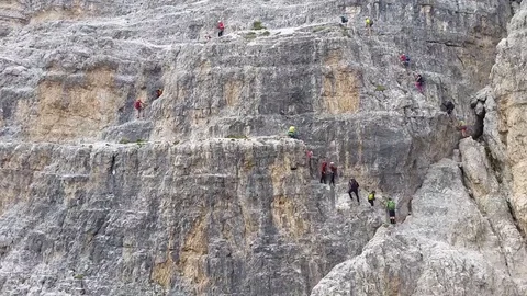 Climbing via ferrata in the dolomites Stock Footage 96986651