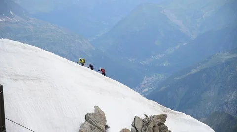 Climbing group walking on the top of snow slope of Mont Blanc, Chamonix, France, Stock Footage 65464308