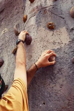 Climbing hands Stock Photos