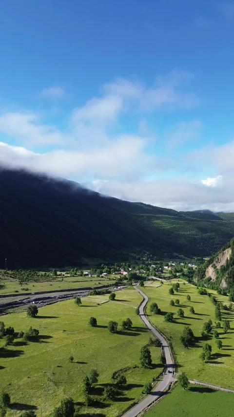 Climbing High Drone Shot Over Mountain Valley Vertical Format 4K RAW Stock Footage 339733766